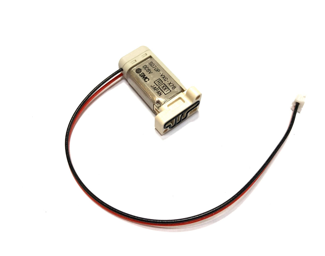 DYE Dye/smc Solenoid Pilot 6V marker solenoid assembly – front view, studio shot